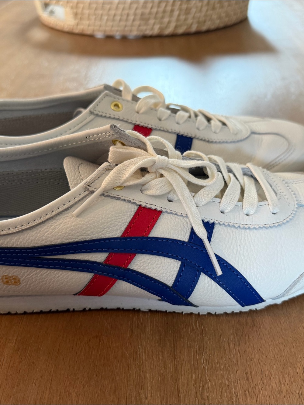 Onitsuka Tiger White Sneakers with Blue & Red Stripes. Only worn once